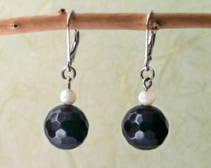 Black banded onyx and mother of pearl shell dangle earrings. Custom design - Motley Mix Jewelry