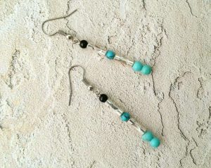 Elegant turquoise, howlite and obsidian stick earrings