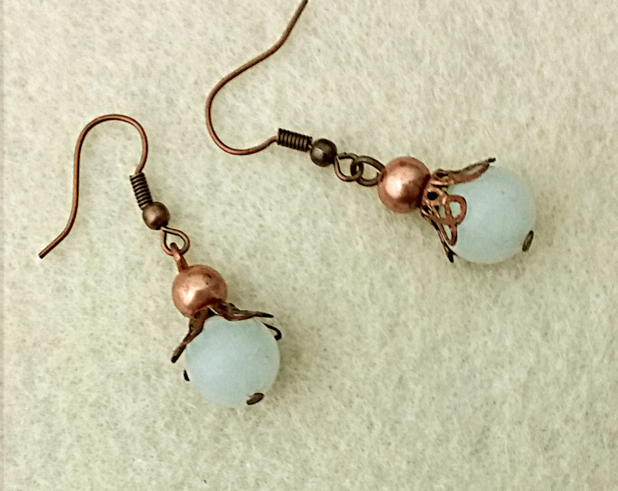 Lightweight dangle earrings with natural pale blue amazonite stones and antiqued copper beads, bead caps, and hooks ~ designed by Motley Mix Jewelry