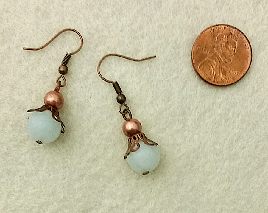 Lightweight dangle earrings with natural pale blue amazonite stones and antiqued copper beads, bead caps, and hooks ~ designed by Motley Mix Jewelry