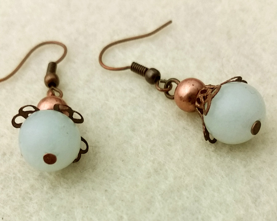 Lightweight dangle earrings with natural pale blue amazonite stones and antiqued copper beads, bead caps, and hooks ~ designed by Motley Mix Jewelry