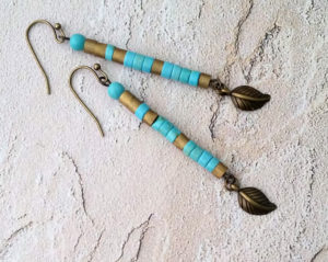 Turquoise dyed howlite and brass tall stick earrings with brass leaf charms